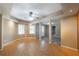 Finished basement with hardwood flooring, recessed lights, windows, and access to the outdoors at 2025 Fairway Crossing Dr, Woodstock, GA 30188