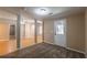 Spacious finished basement with carpeted and laminate flooring, offering versatile space for various activities at 2025 Fairway Crossing Dr, Woodstock, GA 30188