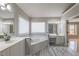 Bright main bathroom with double vanity, jacuzzi tub, and separate shower at 2025 Fairway Crossing Dr, Woodstock, GA 30188
