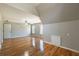 Spacious bedroom features hardwood floors, neutral walls, and a ceiling fan for optimal comfort and style at 2025 Fairway Crossing Dr, Woodstock, GA 30188
