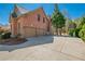 Spacious two-car garage with ample parking and a well-maintained brick exterior at 2025 Fairway Crossing Dr, Woodstock, GA 30188