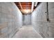 Unfinished basement featuring concrete block walls and exposed pipes at 1420 Stephenson Rd, Lithonia, GA 30058