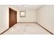 This bedroom offers a closet with folding doors and carpeted floors at 1420 Stephenson Rd, Lithonia, GA 30058