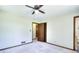 Bedroom featuring neutral walls, carpet, and an en-suite bathroom at 1420 Stephenson Rd, Lithonia, GA 30058