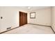 Bedroom featuring neutral walls, carpet, window with wooden blinds and double closet at 1420 Stephenson Rd, Lithonia, GA 30058