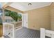 Cozy back porch with wood flooring and a view of the lush backyard at 1615 Orlando Sw St, Atlanta, GA 30311