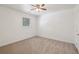 Bedroom featuring carpet, a ceiling fan, and a closet at 1615 Orlando Sw St, Atlanta, GA 30311
