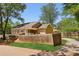 A cozy home with a wooden fence surrounding a grassy yard at 1615 Orlando Sw St, Atlanta, GA 30311