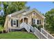 Charming bungalow with inviting front porch and well-maintained lawn at 1615 Orlando Sw St, Atlanta, GA 30311