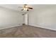 Bedroom featuring soft carpet, neutral paint, a ceiling fan and large windows for ample natural light at 1715 Eden Valley Ct, Loganville, GA 30052