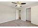 Neutral bedroom featuring carpet flooring, closet, and neutral paint palette at 1715 Eden Valley Ct, Loganville, GA 30052