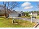 Well-maintained home with a two-car garage, a stone accent, and a neatly kept front yard at 1715 Eden Valley Ct, Loganville, GA 30052