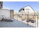 Relaxing outdoor balcony features a lounge chair and views of the community at 6701 Prelude Dr, Atlanta, GA 30328
