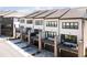 Rows of modern townhomes each with a private balcony and garage at 6701 Prelude Dr, Atlanta, GA 30328