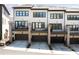 Modern townhomes with garage parking and private balconies at 6701 Prelude Dr, Atlanta, GA 30328