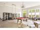 Bright and spacious game room featuring a pool table, comfortable seating, and stylish decor at 6701 Prelude Dr, Atlanta, GA 30328