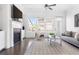 Bright living room with fireplace, modern furniture, and lots of natural light at 6701 Prelude Dr, Atlanta, GA 30328