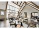 Spacious lounge area features vaulted ceilings and abundant natural light at 6701 Prelude Dr, Atlanta, GA 30328