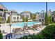 Resort-style pool with ample seating surrounded by manicured landscaping at 6701 Prelude Dr, Atlanta, GA 30328