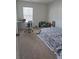 Cozy bedroom with natural light, a desk, and a comfortable bed at 1180 Cades Walk, Lawrenceville, GA 30045