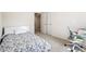 Bright bedroom with modern décor, a single bed, and a glass-top desk at 1180 Cades Walk, Lawrenceville, GA 30045