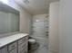 Bathroom featuring bathtub, white vanity and quartz countertop at 1812 Emory Ln # 93, Conyers, GA 30013