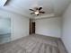 Bedroom with a tray ceiling and an open doorway to the bathroom at 1812 Emory Ln # 93, Conyers, GA 30013