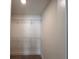 Walk-in closet with white wire shelving and carpeted floors at 1812 Emory Ln # 93, Conyers, GA 30013