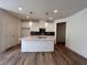 Modern kitchen with an island, stainless sink and backsplash at 1812 Emory Ln # 93, Conyers, GA 30013