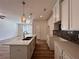 Kitchen featuring a spacious island, modern appliances and stylish backsplash at 1812 Emory Ln # 93, Conyers, GA 30013