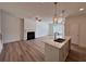 Open-concept living room features a fireplace and flows into the kitchen at 1812 Emory Ln # 93, Conyers, GA 30013