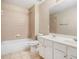 Bathroom with tiled floor, combination tub and shower, and double sink vanity at 2134 Shropshire Se Ln, Atlanta, GA 30316