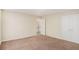 Spacious carpeted bedroom with neutral walls and a double-door closet at 2134 Shropshire Se Ln, Atlanta, GA 30316