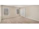 Carpeted bedroom with neutral walls, window, and a double-door closet at 2134 Shropshire Se Ln, Atlanta, GA 30316