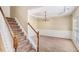 Formal dining room featuring wainscoting, a modern chandelier, and neutral carpeting at 2134 Shropshire Se Ln, Atlanta, GA 30316