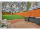 Expansive backyard showing lawn, privacy fence and an outdoor grill station at 3637 Elm St, Atlanta, GA 30354