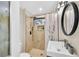 Modern bathroom with walk-in shower, a sleek vanity, and contemporary fixtures and tile at 3637 Elm St, Atlanta, GA 30354