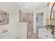 Bathroom showcases a glass enclosed shower and view through a doorway to the bedroom at 3637 Elm St, Atlanta, GA 30354