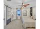 This cozy bedroom boasts a bed with a modern lamp, shelving, and sliding barn doors at 3637 Elm St, Atlanta, GA 30354