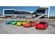 Exterior view of a Porsche dealership with multiple sports cars lined up in front of the building at 3637 Elm St, Atlanta, GA 30354