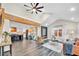 Bright open floorplan, wood floors, vaulted ceilings, and seamless flow to kitchen at 3637 Elm St, Atlanta, GA 30354