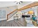 Stylish interior with a view of the open floor plan, staircase, and modern furniture at 3637 Elm St, Atlanta, GA 30354