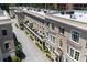 Stunning aerial view of luxury townhomes showcasing elegant architecture and landscaped courtyards at 2440 Peachtree Nw Rd # 1, Atlanta, GA 30305