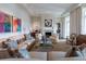 Bright living room with neutral decor, fireplace, and large windows for ample natural light at 2440 Peachtree Nw Rd # 1, Atlanta, GA 30305