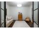 The living room has a small sofa, a wooden chest of drawers, and hardwood floors at 2440 Peachtree Nw Rd # 1, Atlanta, GA 30305