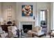 Elegant living room with fireplace and views through the doorway at 2440 Peachtree Nw Rd # 1, Atlanta, GA 30305