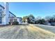 Spacious backyard showcasing a well-manicured lawn and outdoor features of the home at 3550 Lakeheath Dr, Cumming, GA 30041