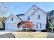 Charming two-story home with a well-maintained lawn and curb appeal at 3550 Lakeheath Dr, Cumming, GA 30041