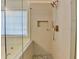 Detail of the bathroom shower featuring a window at 3550 Lakeheath Dr, Cumming, GA 30041