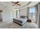 This gorgeous bedroom features large windows and is filled with natural light at 6187 Kelly Carlin Way, Norcross, GA 30071